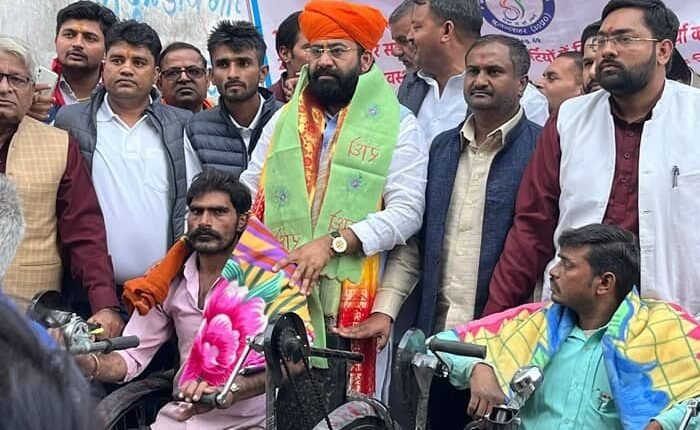 MLA distributed tricycles and blankets to the disabled on his birthday.