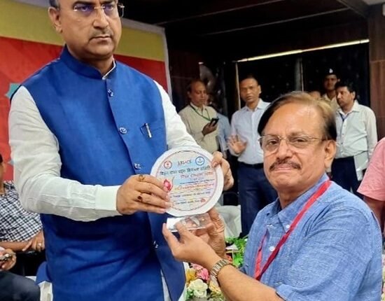 Health Minister honored Dr. Ravi Ranjan for his excellent work