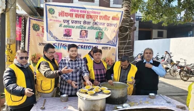 Food was provided to the needy in Prabhu Prasad Seva Camp, Prabhu Prasad Seva Camp was organised by Lions Club Rampur Elite