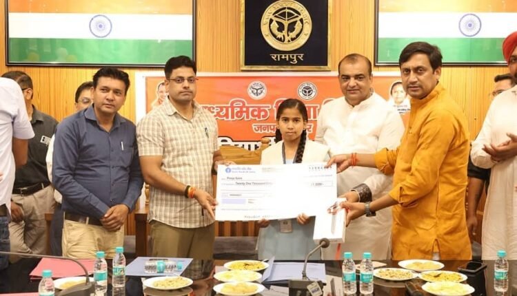 An award ceremony was organized for students who performed well in high school and intermediate examinations