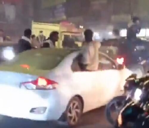 Rich kids causing terror at Begumpul, performing stunts while blaring their car horns.