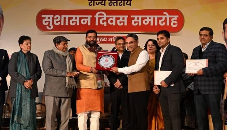 Vivek Kalia addition director Public Relations getting award from Haryana CM Naib Saini for implementing above project.