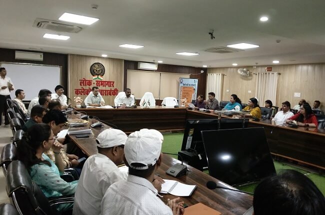 An updated review meeting regarding ongoing land consolidation operations and pending cases in the district, presided over by District Magistrate Ishan Pratap Singh.