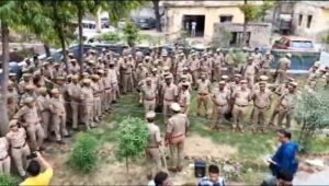 Administration's bulldozer razes illegal shrine built on PWD road in Loni