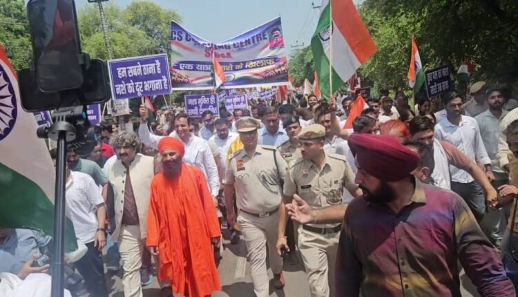 SP Deepak Saharan rallies against drug abuse during a foot march, calls for the social boycott of drug peddlers.